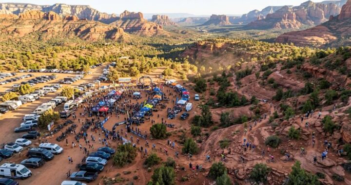 Aerial view of Sedona red rock trails with mountain bikers riding during the 2026 festival weekend